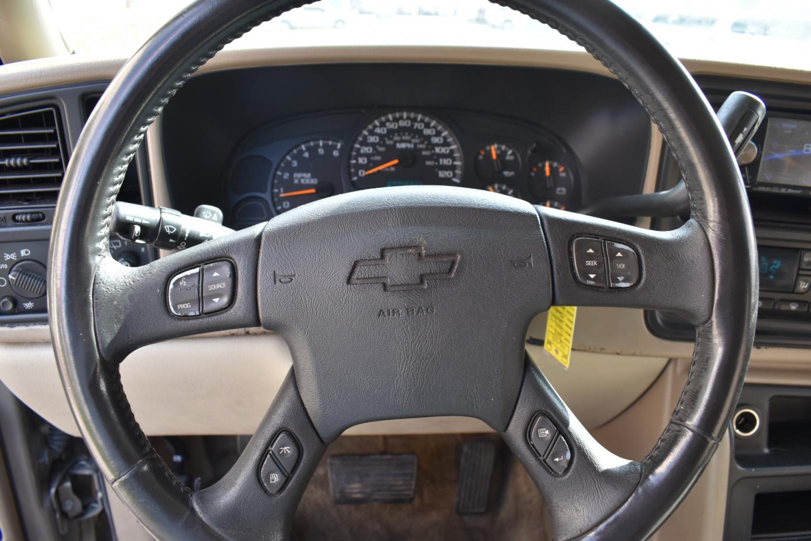 2003 Gold /Tan Chevrolet Suburban (1GNEC16Z23J) with an V8, 5.3.0L engine, 4 SPEED AUTOMATIC transmission, located at 5925 E. BELKNAP ST., HALTOM CITY, TX, 76117, (817) 834-4222, 32.803799, -97.259003 - Buying a 2003 Chevrolet Suburban can offer several benefits, including: Spaciousness: The Suburban is known for its ample interior space, making it great for large families, hauling cargo, or even converting into a camper. Towing Capacity: It's equipped with a robust engine and frame, allowing it - Photo#7